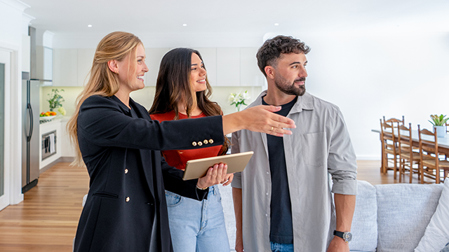 A panoramic view of modern high-rise buildings and city skyline at dusk. Mukhiya G Estates is a Trusted Property Dealer in Delhi NCR, offering reliable real estate consulting services.